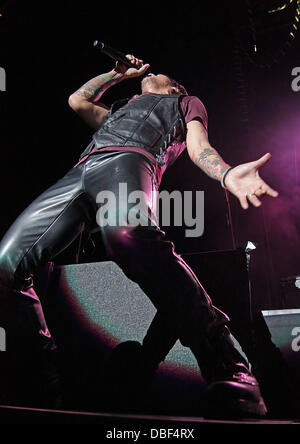 Arnel Pineda of Journey performing at Manchester MEN Arena on their 'Don't Stop Believin' Tour. Manchester, England - 08.06.11 Stock Photo