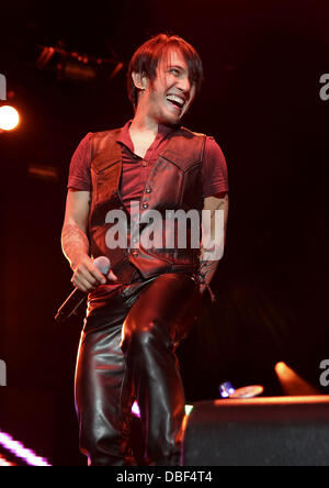 Arnel Pineda of Journey performing at Manchester MEN Arena on their 'Don't Stop Believin' Tour. Manchester, England - 08.06.11 Stock Photo