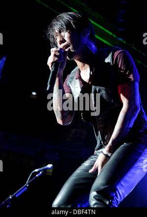 Arnel Pineda of Journey performing at Manchester MEN Arena on their 'Don't Stop Believin' Tour. Manchester, England - 08.06.11 Stock Photo