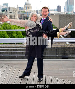 Ann Widdecombe and Anton du Beke join forces with Bupa at the National Theatre to encourage older people to dance their way to better health. Former politician and 2010 Strictly Come Dancing contestant Ann Widdecombe and professional ballroom dancer Anton du Beke are joining Bupa to help launch the initiative and offer dance demonstrations to Bupa care home residents. London, Engla Stock Photo