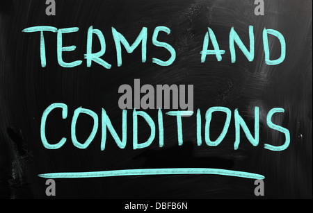 Terms & Conditions handwritten with chalk on a blackboard Stock Photo