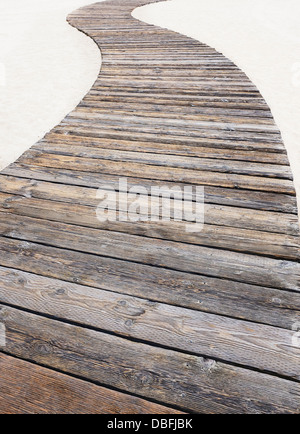 Wooden walkway on beach Stock Photo