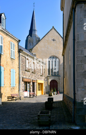 Road and church at Sainte-Suzanne, ranked one the most beautiful villages, fortified town in the Mayenne department, Pays-de-la- Stock Photo