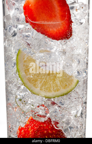 ice cubes with strawberries and lemon Stock Photo