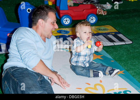 Drew Lachey, Lea Dellecave and son Hudson The Pampers 50th