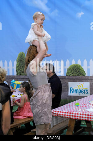 Drew Lachey, Lea Dellecave and son Hudson The Pampers 50th