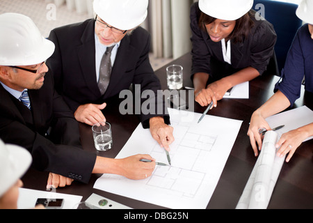 Engineers discussing about a new project Stock Photo
