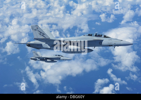 Two Royal Australian Air Force F-18 Super Hornets prepare to refuel off the coast of Queensland, Australia, July 26, 2013. The refueling mission was part of Talisman Saber 2013, an exercise that provides realistic, relevant training necessary to maintain Stock Photo