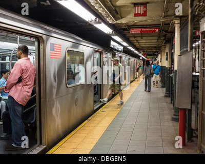New York City subway station platform and train Stock Photo