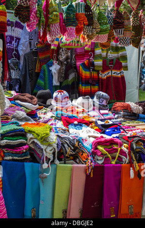 Chilean brightly coloured knitwear on a market stall in Punta Arenas Stock Photo