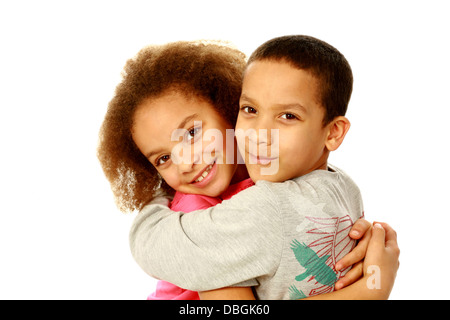 smiling black children hugging with copy space Stock Photo