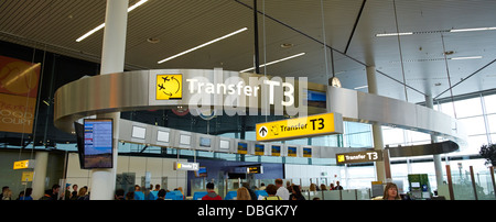 Airport transfer signs. Amsterdam Schiphol Airport. Stock Photo