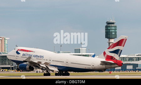 A wide body Boeing 747 jetliner, belonging to British Airways (BA) lands at Vancouver International Airport Stock Photo