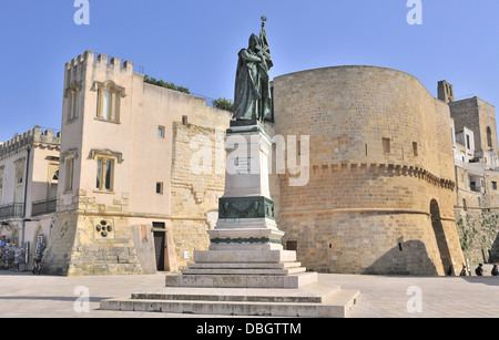 Statue for the heroes and martyrs of Otranto,who were killed during the Ottoman invasion of 1480, and Castello of Otranto,Otranto,Lecce Province Italy Stock Photo