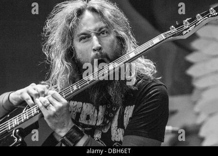 Heavy Metal band Mastodon performing live at Mayhem Fest 2013. Mastodon is an American heavy metal band from Atlanta, Georgia, formed in  2000. The band consists of bassist and vocalist Troy Sanders, guitarist Brent Hinds, guitarist Bill Kelliher and drummer Brann Dailor. Stock Photo