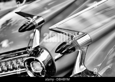 1950s Cadillac. Sharp tail fins with dual bullet tail lights. Monochrome Abstract. Stock Photo