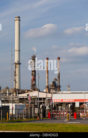 ESSO depot and refinery in the harbor of Antwerp during daytime. Stock Photo