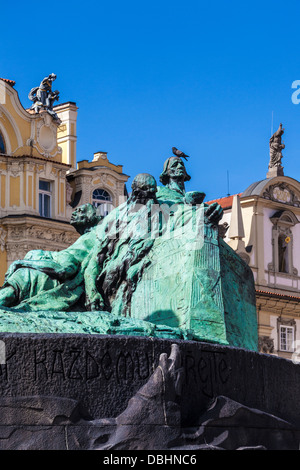 A pigeon sits atop the Jan Hus Memorial in the Old Town Square, Prague. Stock Photo