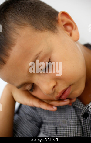 6-year-old boy falling asleep Stock Photo