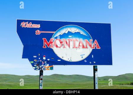 Welcome to Montana sign pockmarked with bullet holes, Montana, USA Stock Photo