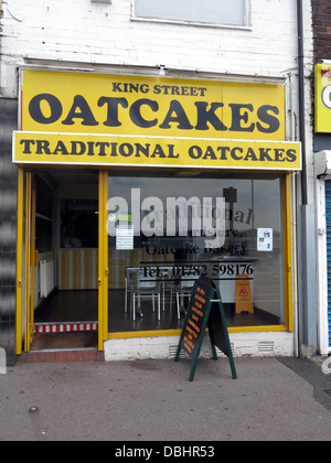 Exterior of a traditional Stoke / Staffordshire Oatcake shop, with bright yellow frontage. Stock Photo