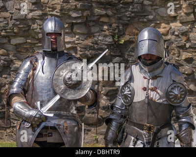 Two knights in armour in an historical Medieval  Tournament re-enactment Stock Photo