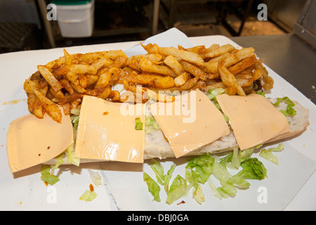 Full House gatsby sandwich being prepared at the Golden Dish take away in Athlone, Cape Town, South Africa. Stock Photo