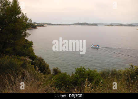View of Boat from Skiathos town to Kanapitsa & Nostos. Stock Photo