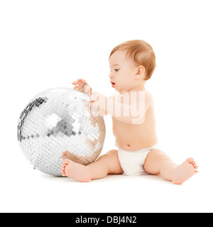 child playing with disco ball Stock Photo