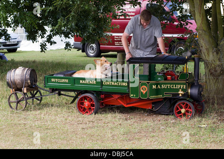 Foden C Type Lorry 4 Inch Scale Miniature Steam Engine with Dog sitting in the Trailer Stock Photo