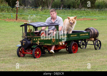 Foden C Type Lorry 4 Inch Scale Miniature Steam Engine with Dog sitting in the Trailer Stock Photo