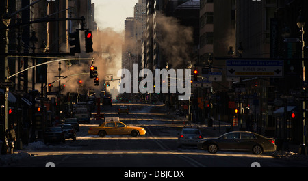 A taxi is seen crossing Madison Avenue at sunrise in New York, NY, USA, February 10, 2013. (Adrien Veczan) Stock Photo
