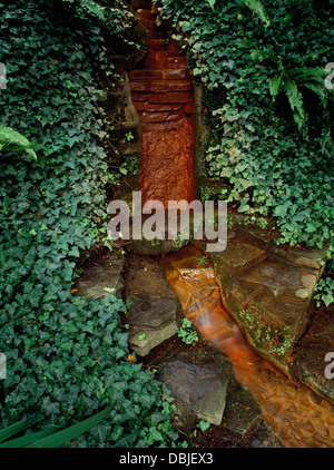 Chalice Well Gardens, Glastonbury, Somerset: a healing chalybeate spring associated with the Earth Goddess and legends of the Holy Grail Stock Photo