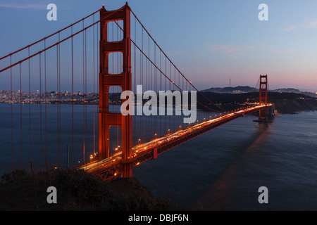 Close-up of Golden Gate Bridge at twilight viewed from cliffs on north side of bridge Stock Photo