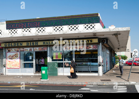 Exterior of the Golden Dish take-away in Athlone, Cape Town, South Africa. Stock Photo