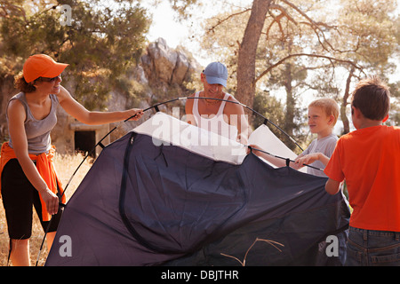 Croatia, Dalmatia, Family holidays on camping site, pitching the tent Stock Photo