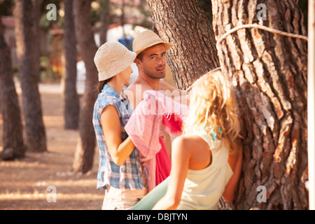 Croatia, Dalmatia, Family On Camping Site, Hanging Out The Laundry Stock Photo