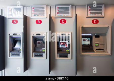 Indoor ATM cash dispensers at cashpoint of the Belgian Belfius bank, Belgium Stock Photo