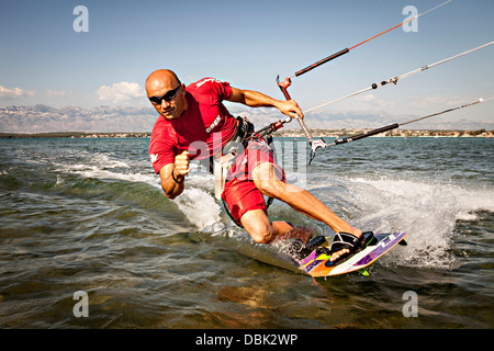 Croatia, Man kite surfing at high speed Stock Photo