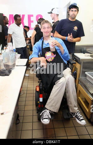 Zach Anner creates his Handi-Cappuccino shake at Millions Of Milkshakes in West Hollywood. Ingredients include vanilla ice cream, coffee powder, crushed oreo cookies, caramel, chocolate cyrup, whipped cream and a cherry West Hollywood, California - 29.06. Stock Photo