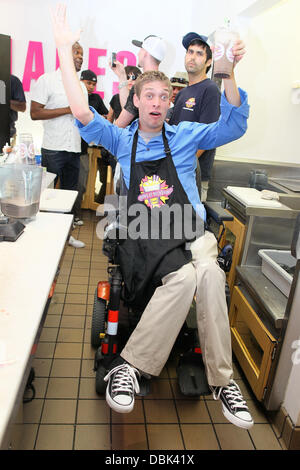 Zach Anner creates his Handi-Cappuccino shake at Millions Of Milkshakes in West Hollywood. Ingredients include vanilla ice cream, coffee powder, crushed oreo cookies, caramel, chocolate cyrup, whipped cream and a cherry West Hollywood, California - 29.06. Stock Photo