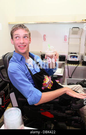 Zach Anner creates his Handi-Cappuccino shake at Millions Of Milkshakes in West Hollywood. Ingredients include vanilla ice cream, coffee powder, crushed oreo cookies, caramel, chocolate cyrup, whipped cream and a cherry West Hollywood, California - 29.06. Stock Photo