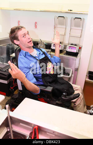 Zach Anner creates his Handi-Cappuccino shake at Millions Of Milkshakes in West Hollywood. Ingredients include vanilla ice cream, coffee powder, crushed oreo cookies, caramel, chocolate cyrup, whipped cream and a cherry West Hollywood, California - 29.06. Stock Photo