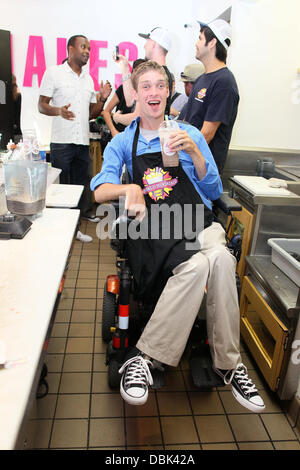 Zach Anner creates his Handi-Cappuccino shake at Millions Of Milkshakes in West Hollywood. Ingredients include vanilla ice cream, coffee powder, crushed oreo cookies, caramel, chocolate cyrup, whipped cream and a cherry West Hollywood, California - 29.06. Stock Photo