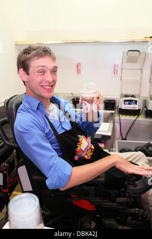 Zach Anner creates his Handi-Cappuccino shake at Millions Of Milkshakes in West Hollywood. Ingredients include vanilla ice cream, coffee powder, crushed oreo cookies, caramel, chocolate cyrup, whipped cream and a cherry West Hollywood, California - 29.06. Stock Photo