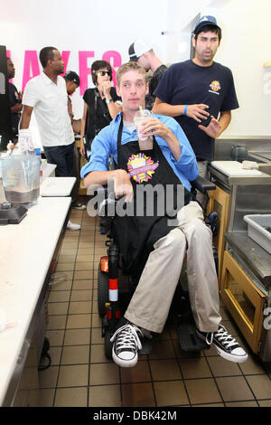 Zach Anner creates his Handi-Cappuccino shake at Millions Of Milkshakes in West Hollywood. Ingredients include vanilla ice cream, coffee powder, crushed oreo cookies, caramel, chocolate cyrup, whipped cream and a cherry West Hollywood, California - 29.06. Stock Photo