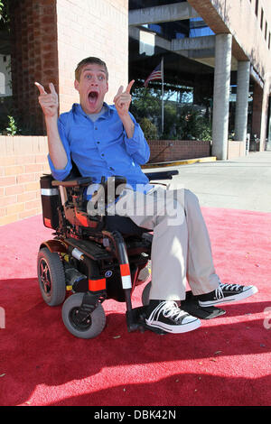 Zach Anner creates his Handi-Cappuccino shake at Millions Of Milkshakes in West Hollywood. Ingredients include vanilla ice cream, coffee powder, crushed oreo cookies, caramel, chocolate cyrup, whipped cream and a cherry West Hollywood, California - 29.06. Stock Photo