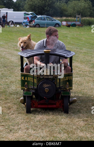 Foden C Type Lorry 4 Inch Scale Miniature Steam Engine with Dog sitting in the Trailer Stock Photo