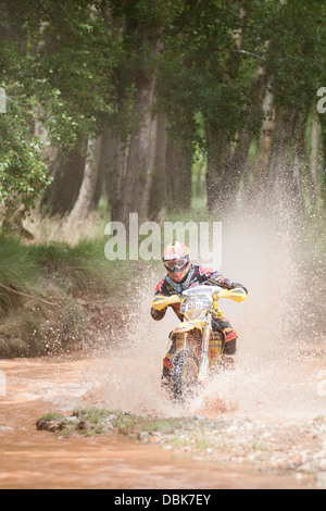 Rider in Baja Aragon Crossing 'Dry River' Stock Photo