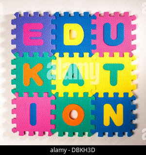 Interlocking foam letters spelling incorrectly the word Edukation. Stock Photo